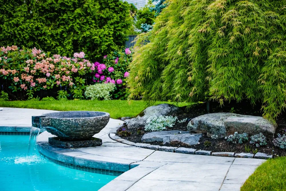 Trusted landscape installation for homes in Newton, MA by Jon Sneider Lawn Care & Tree Service