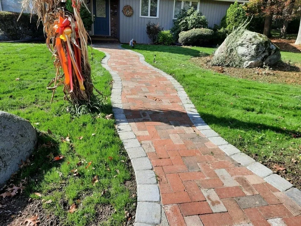 Professional outdoor landscaping for year-round maintenance in East Longmeadow, MA by Jon Starr Landscaping & Design