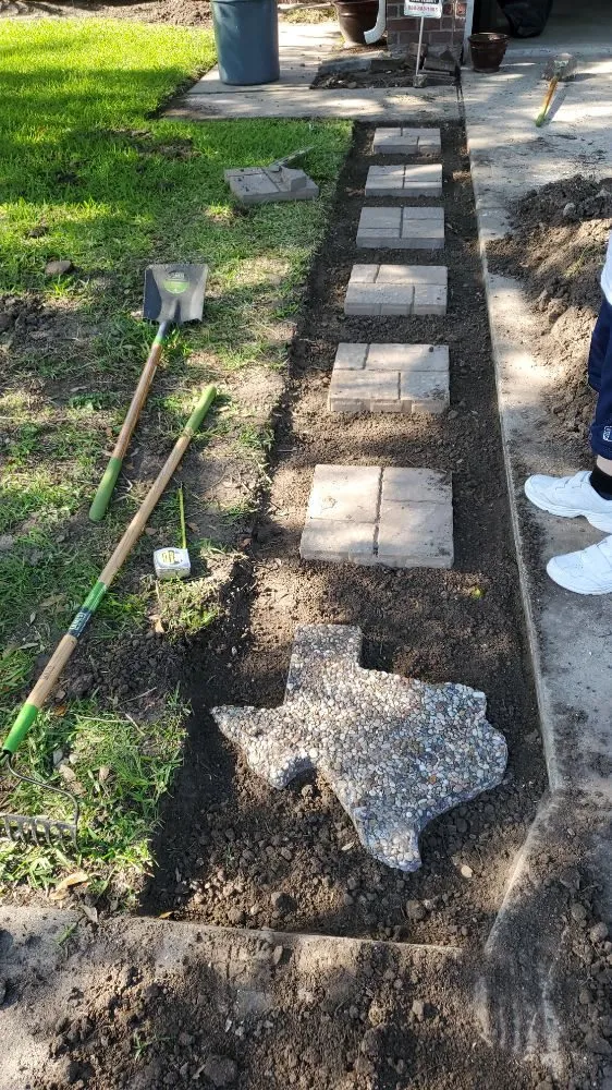 Custom residential landscaping for year-round maintenance in Spring, TX by Jon's Lawn Miracles