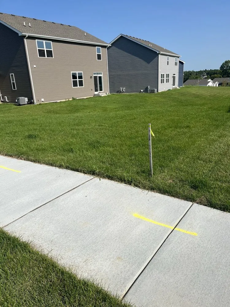 Custom landscape installation for year-round maintenance in Streamwood, IL by Jorge Landscaping