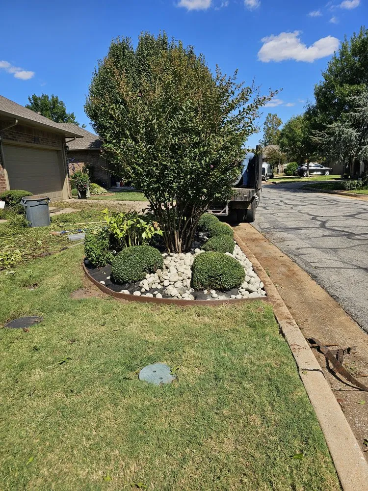 Custom landscape installation for residential properties in Yukon, OK by Jorge's Lawn Care and Landscape