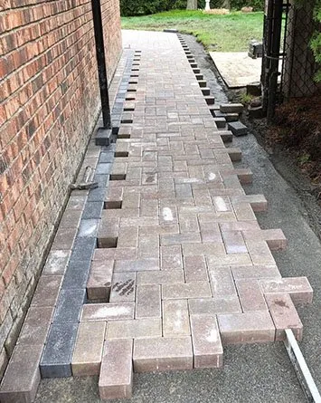 Custom landscape design for homes in Colby, WI by Jorge's Lawn Care