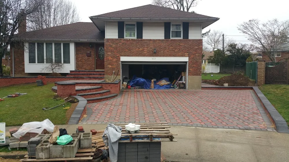 Custom landscape installation in Westbury, NY by Jose Landscaping & Construction