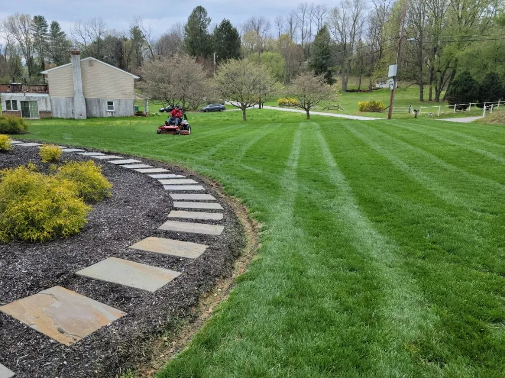 Professional yard maintenance for homes in Coatesville, PA by Jose Landscaping