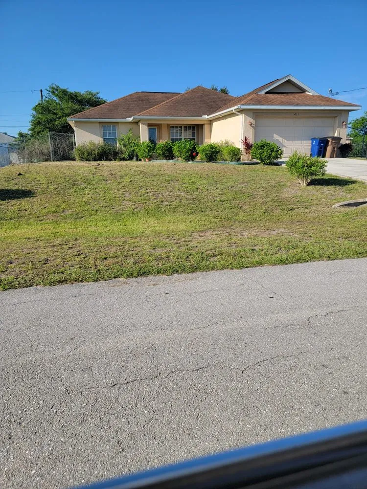 Trusted lawn mowing service for homes in Lehigh Acres, FL by Joseph Lawn Care Service