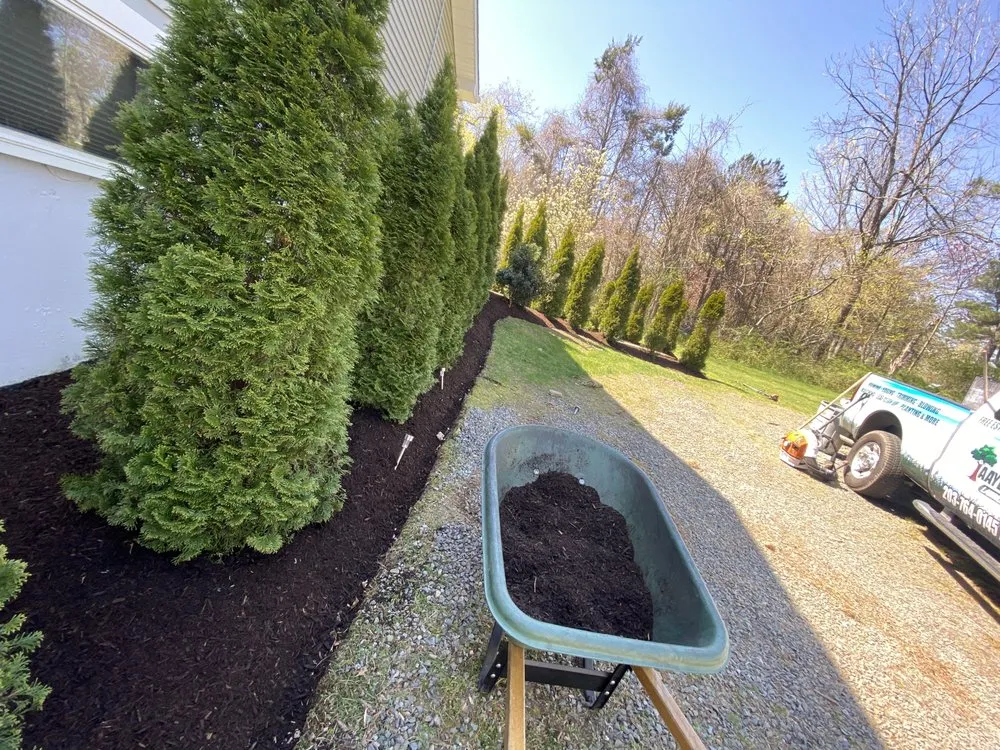 Custom landscape design with custom design in East Haven, CT by Joseph’s Lawncare & Landscaping