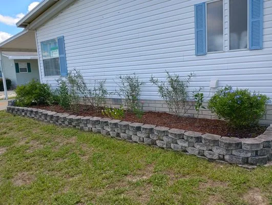 Josh's Lawn and Landscaping Logo