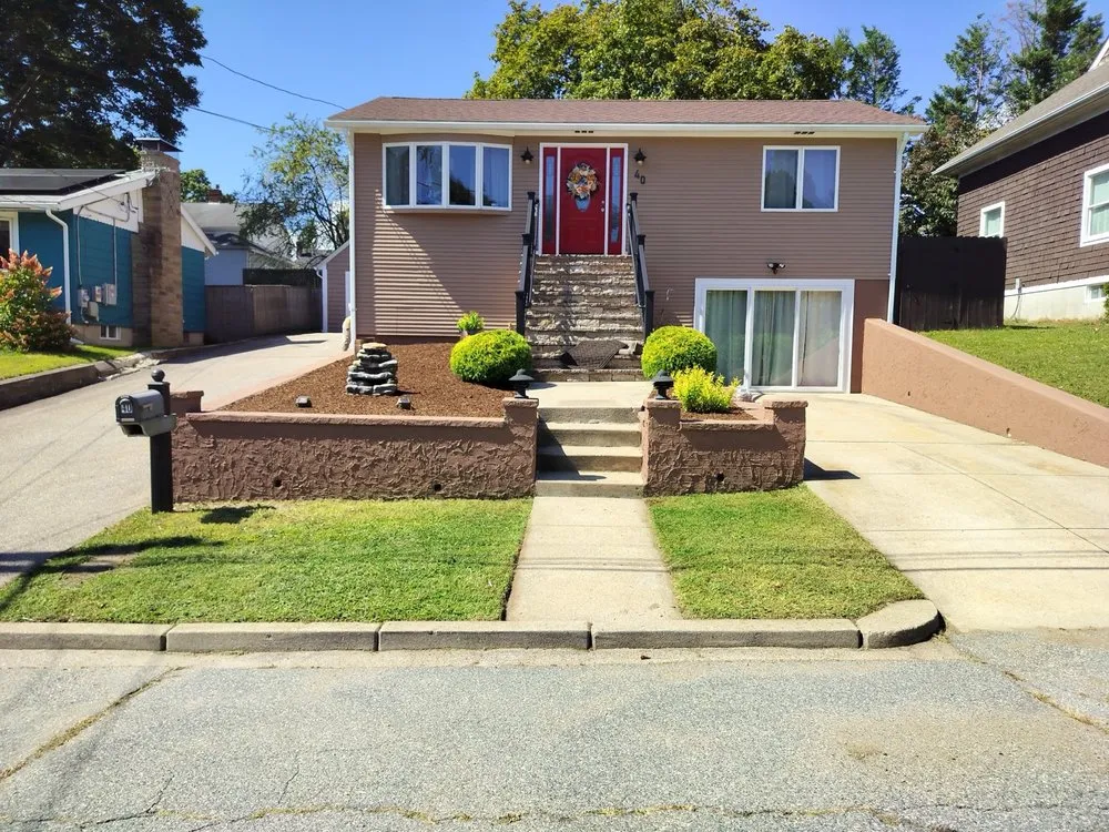 Top-rated lawn mowing service with custom design in Warren, RI by Joshua Services