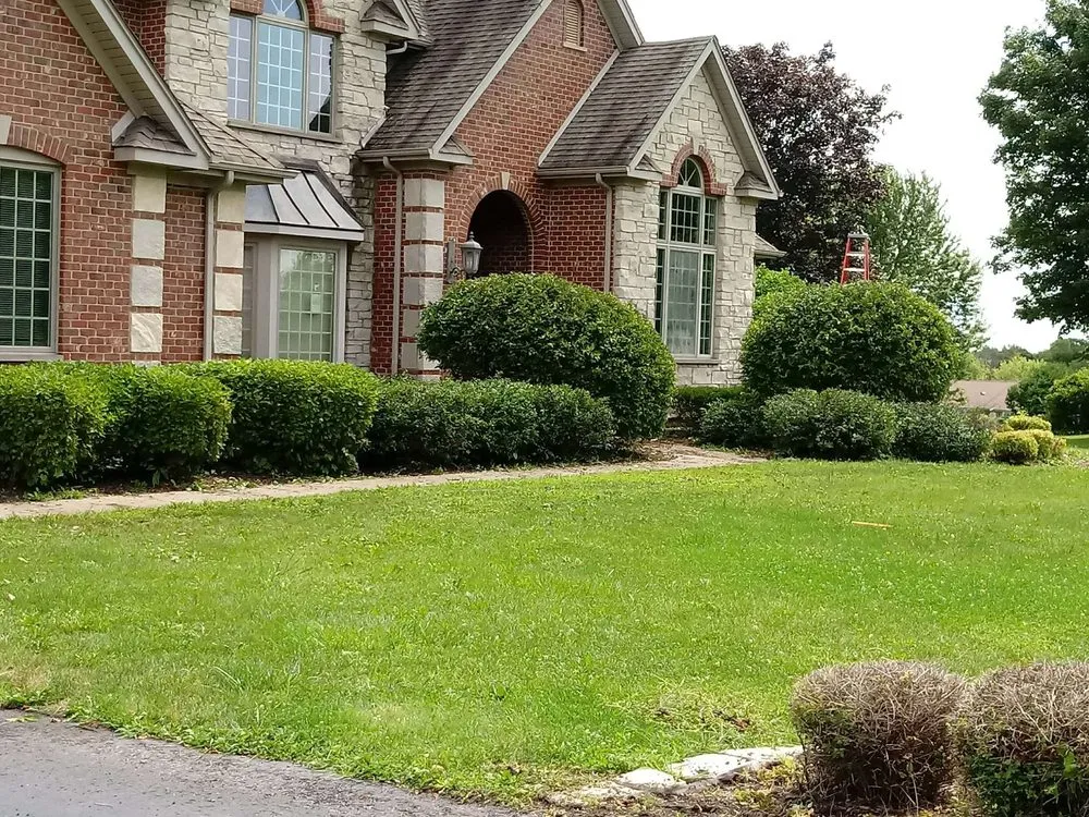 Professional outdoor landscaping for homes in McHenry, IL by JP Fabian Lawn Care