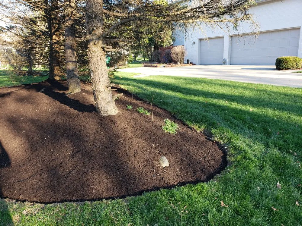 Custom lawn care service for year-round maintenance in Carmel, IN by JPJ Landscaping