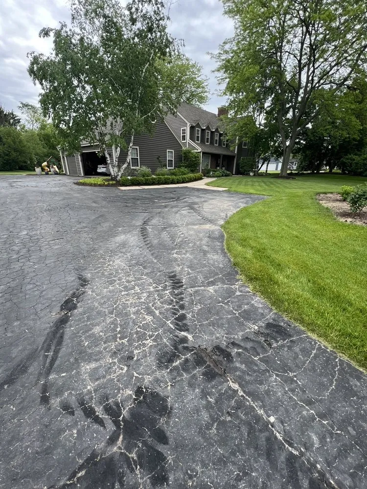 Trusted lawn mowing service for homes across Mequon, WI - J.R. Boehlke