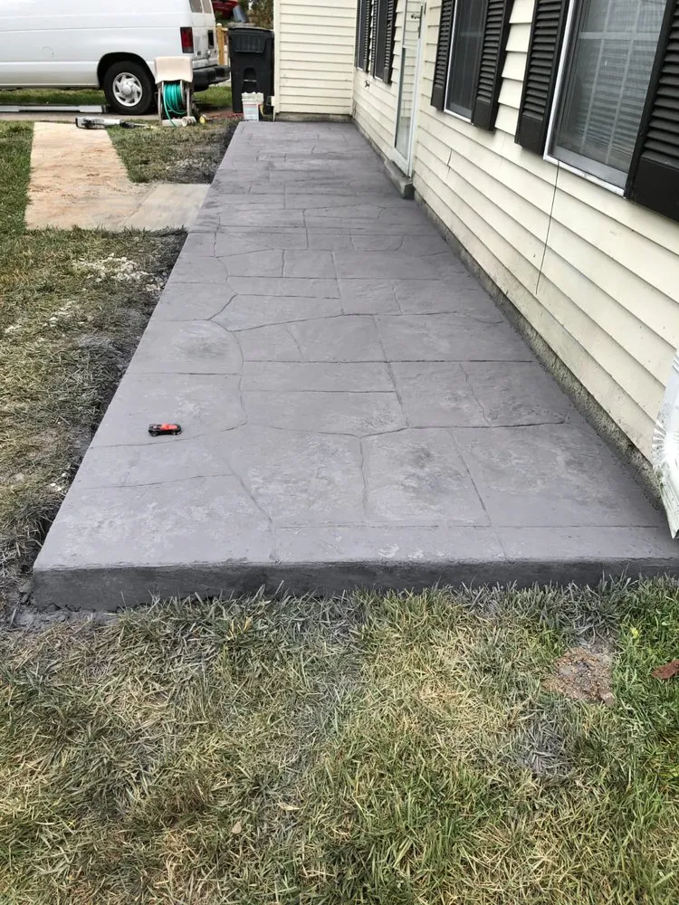 Custom outdoor landscaping with custom design across Manassas, VA - JR Concrete & Remodeling