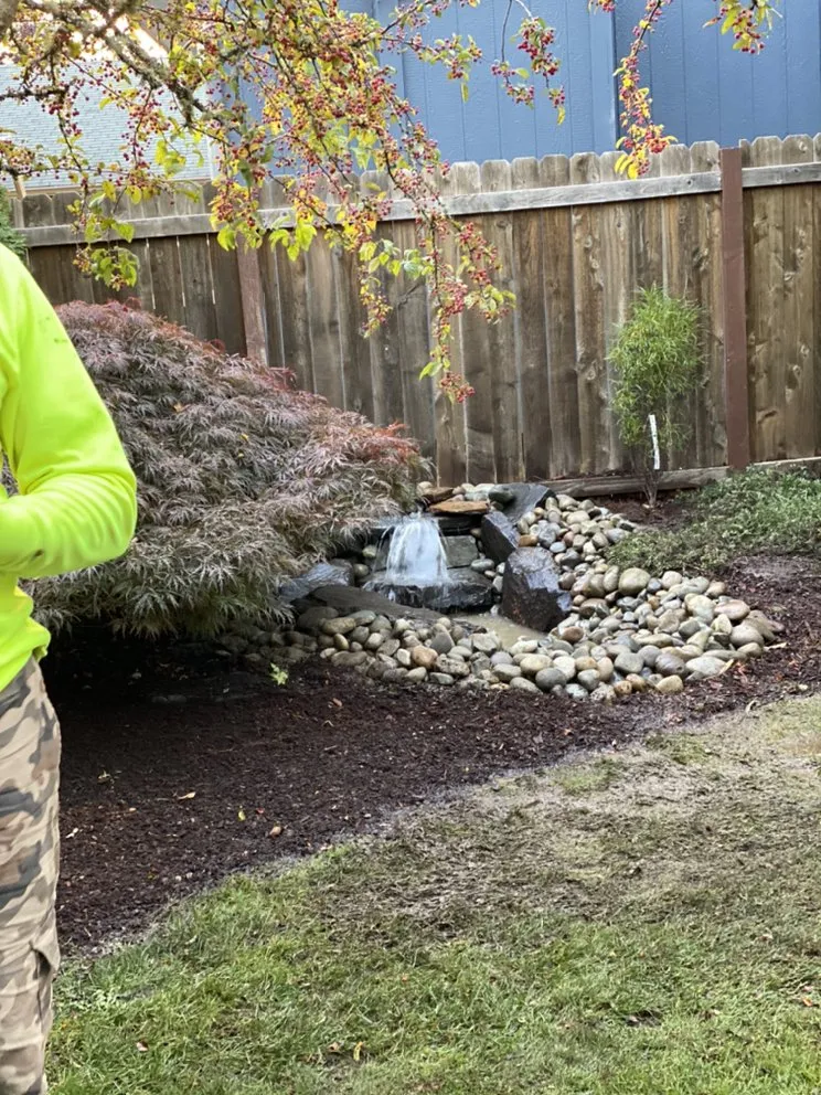 Professional lawn mowing service for beautiful yards in Tacoma, WA by JR Hardscape & Landscape