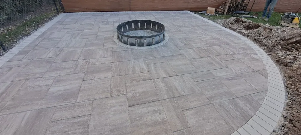 Professional lawn care service for year-round maintenance in Elgin, IL by JR Pavers & Landscaping