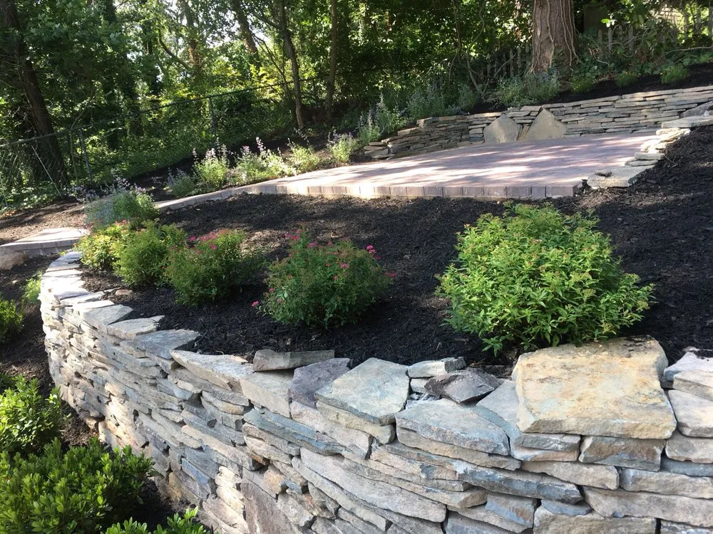 Custom garden landscaping for outdoor upgrades in Central Islip, NY by JR Rubi Tree Services