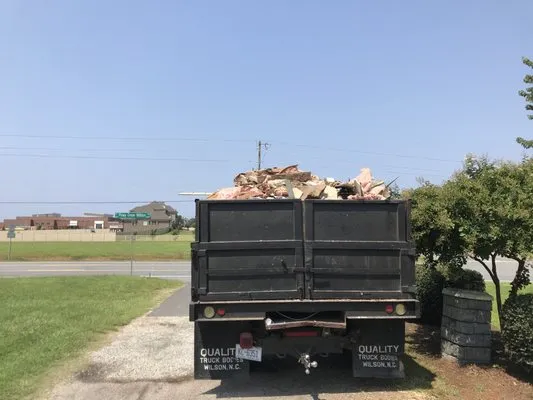 JRs lawn service and trash removal Logo