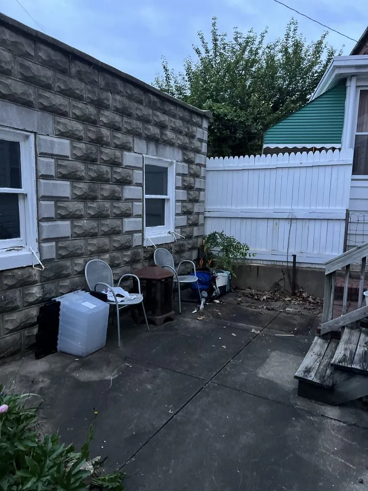 Professional lawn mowing service for residential properties in Essex, MD by JS Haul Install Do It All