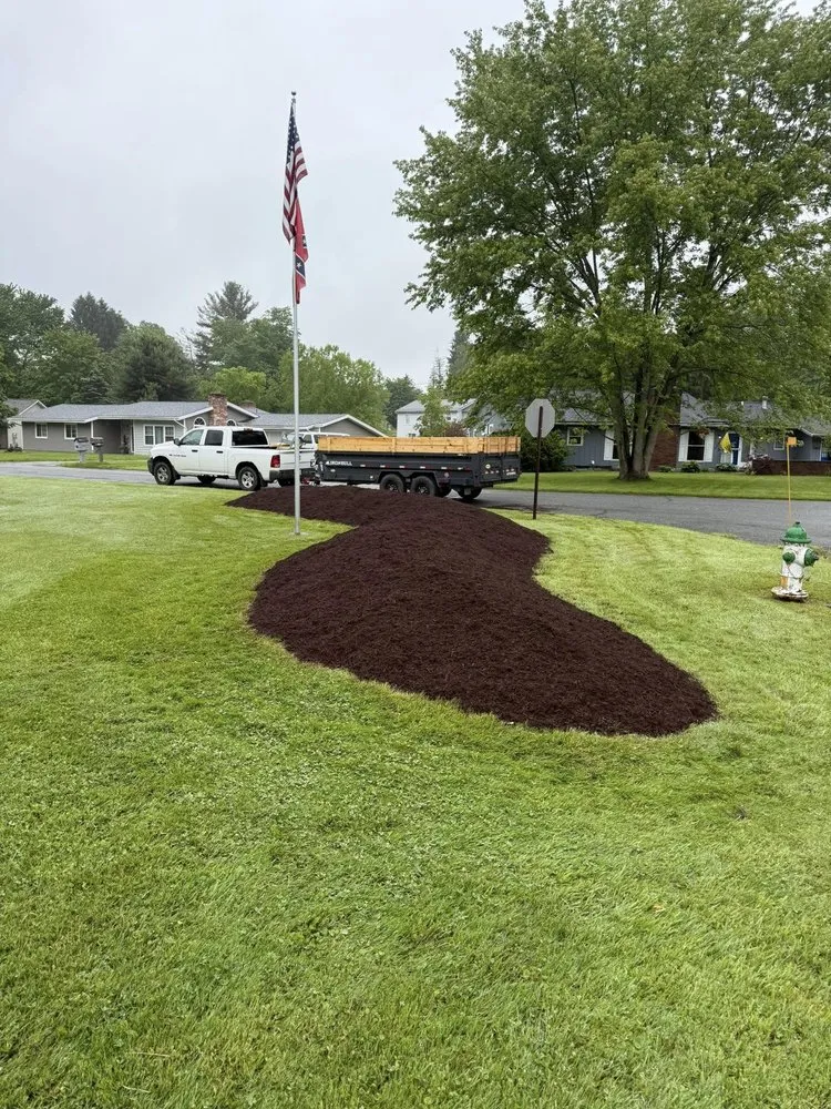 Professional garden landscaping in Garrettsville, OH by J&S Land and Dump Trailer Services