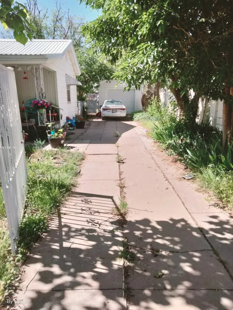 Custom garden landscaping with custom design across Portales, NM - J&S Landscaping