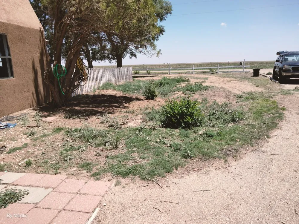 Custom yard maintenance for homes in Portales, NM by J&S Landscaping