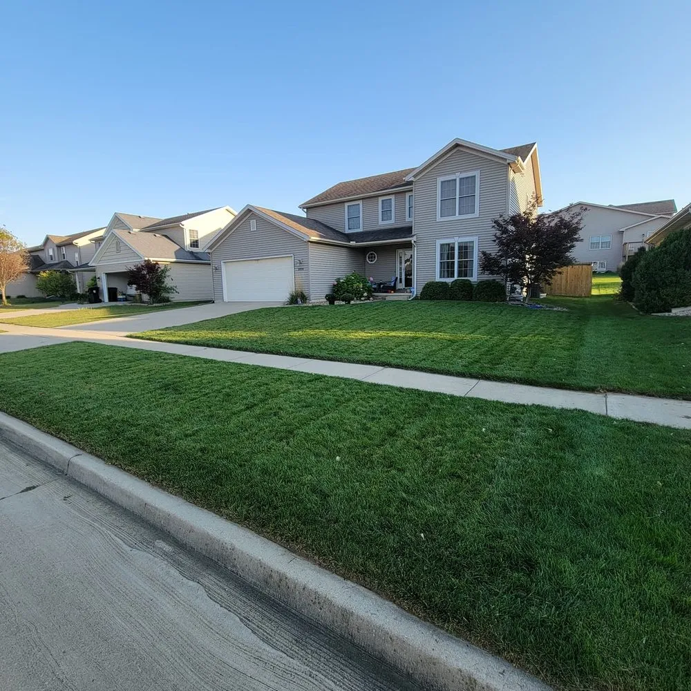 Professional lawn care service for beautiful yards in Normal, IL by JT & Sons Lawn Care