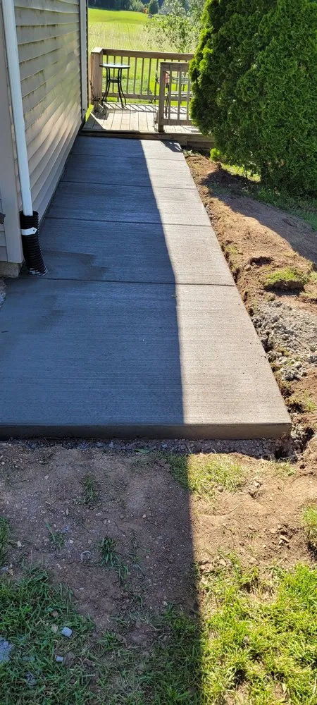 Affordable yard cleanup service with custom design across Rock Springs, WI - JT Custom Concrete and Landscaping