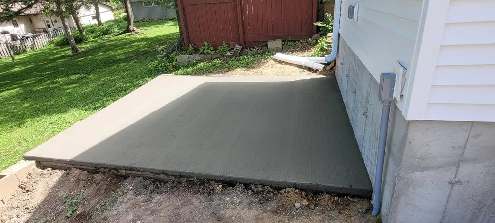 Expert garden landscaping for year-round maintenance in Rock Springs, WI by JT Custom Concrete and Landscaping