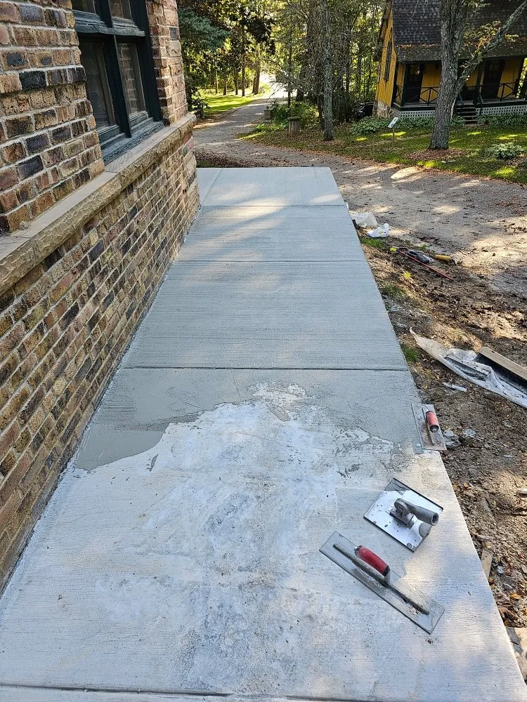 Professional lawn mowing service for outdoor upgrades across Rock Springs, WI - JT Custom Concrete and Landscaping