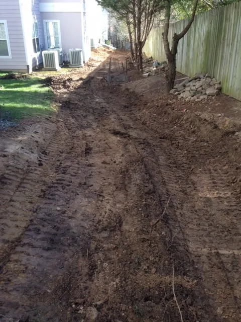 Professional yard maintenance with custom design in Chapel Hill, NC by JT Grading and Drainage Solutions