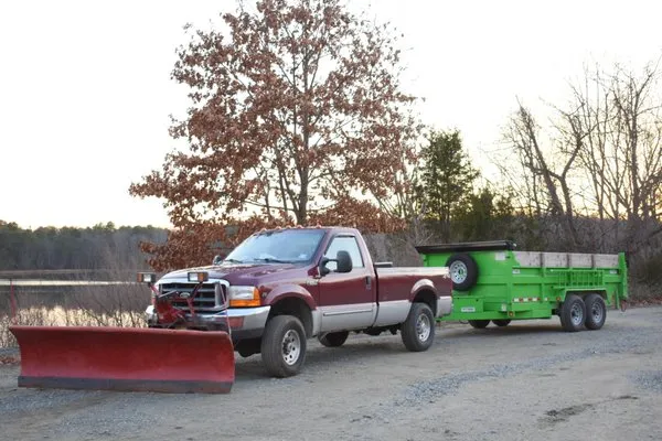 JT Plowing & Landscaping Logo