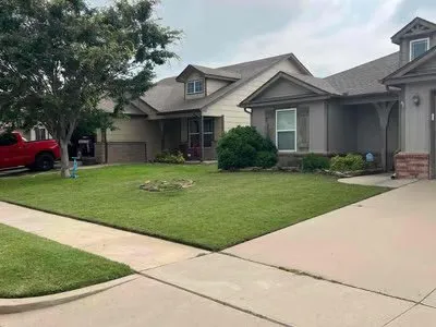 Professional yard cleanup service for year-round maintenance in Yukon, OK by JTD Lawn Service