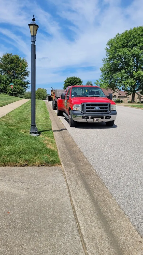 Trusted yard cleanup service for year-round maintenance in Owensboro, KY by Jthomas Lawn Care Services