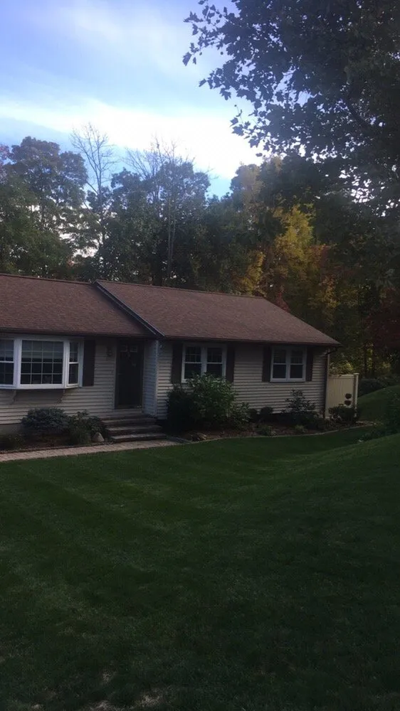 Expert lawn mowing service for residential properties across Meriden, CT - JTL Landscape Solutions