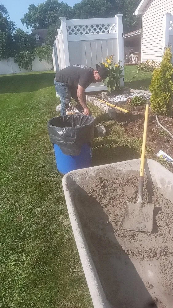 Custom yard maintenance in Amityville, NY by Juan & Dunglas