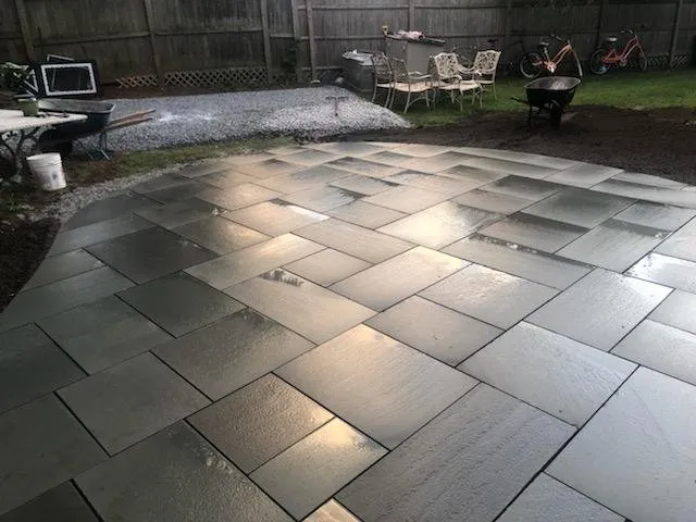 Affordable outdoor landscaping for residential properties in Auburndale, MA by Juan Carlos Caruso Landscaping & Snow Plowing