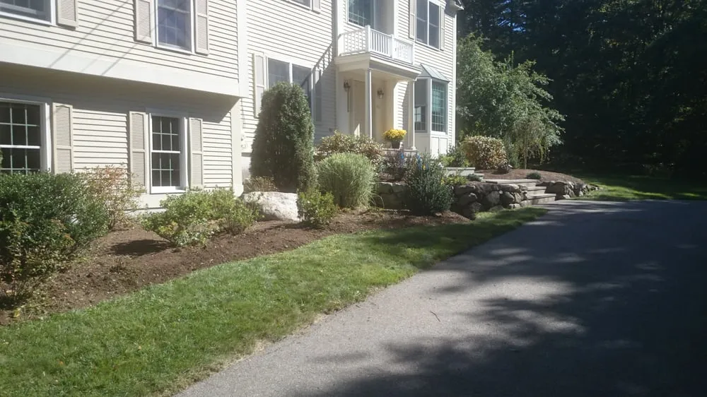 Trusted lawn mowing service with custom design across Auburndale, MA - Juan Carlos Caruso Landscaping & Snow Plowing