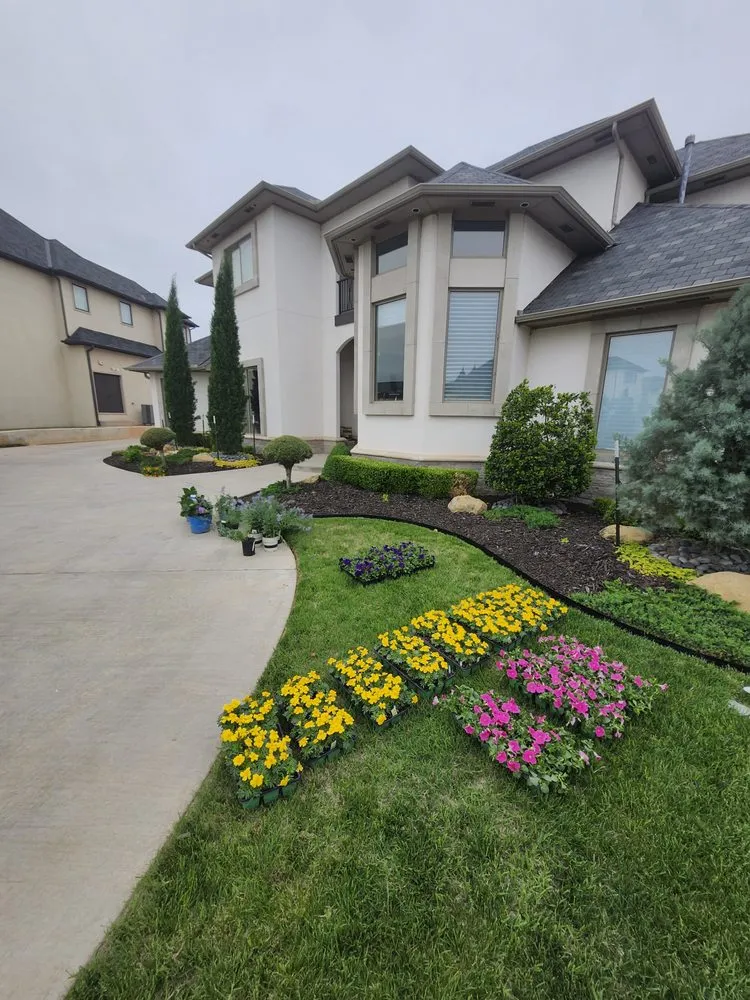 Custom landscape design for year-round maintenance across Norman, OK - Juan Lawn Care