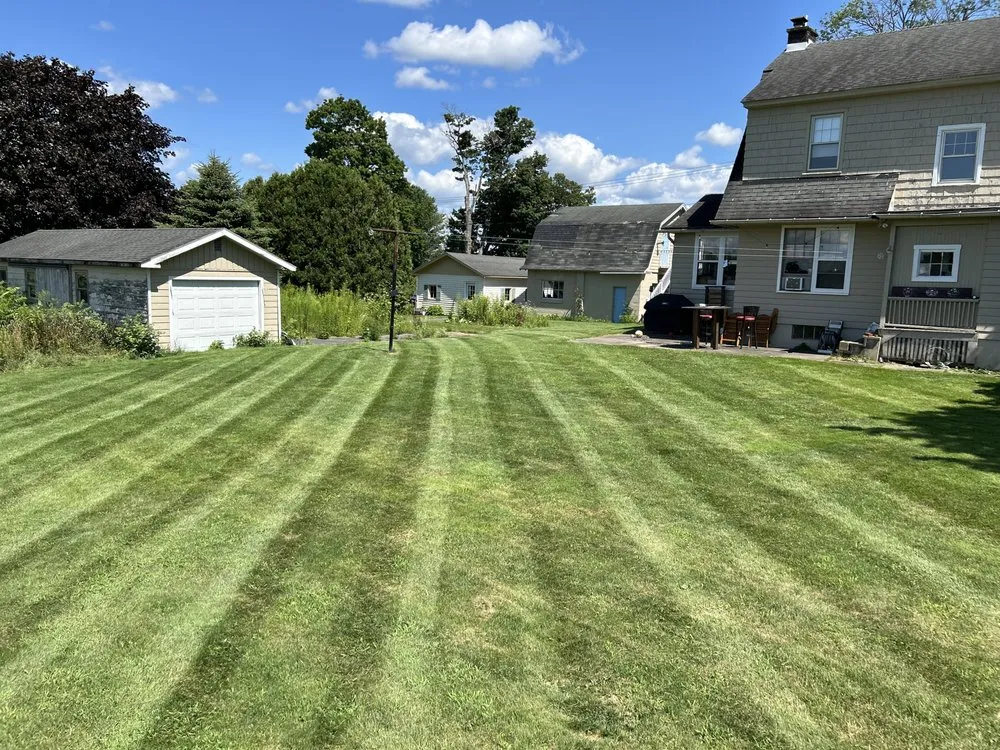 Reliable lawn mowing service for year-round maintenance in Whitesboro, NY by Judd Rd Property Maintenance