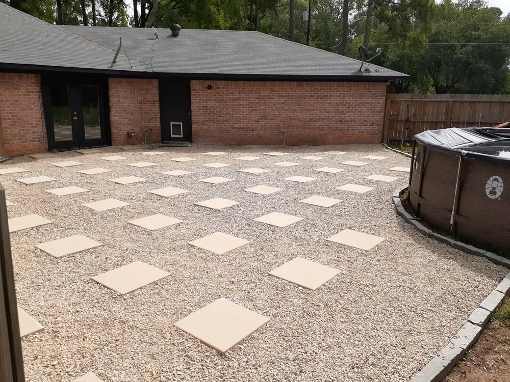 Local yard cleanup service for residential properties in Gladewater, TX by Jud's Landscaping and Exterior Design