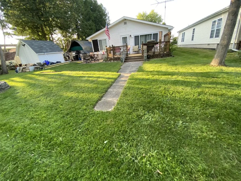 Custom outdoor landscaping in Beaverton, MI by Junebug’s Lawn Care Services