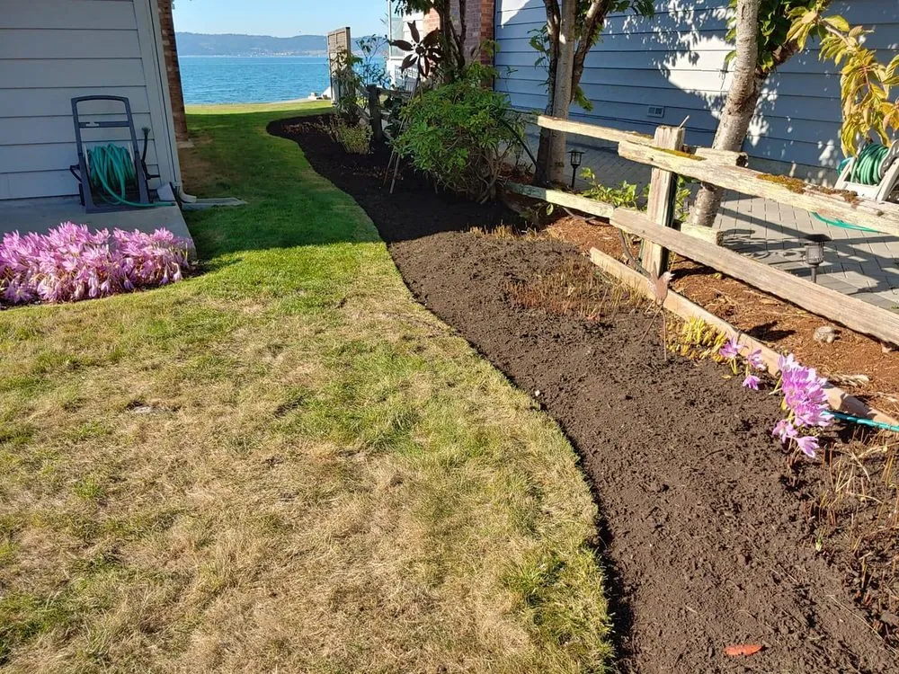 Affordable lawn care service with custom design in Camano Island, WA by Junior's Gardens Landscape