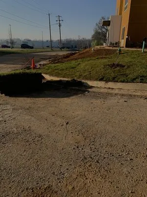 Juniors lanscaping & Irrigation Logo