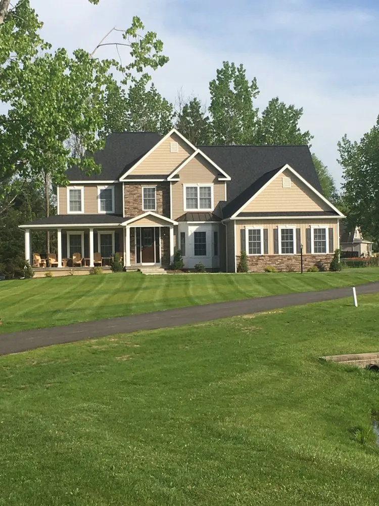 Affordable lawn care service with custom design in East Greenbush, NY by Juniors Lawn Care