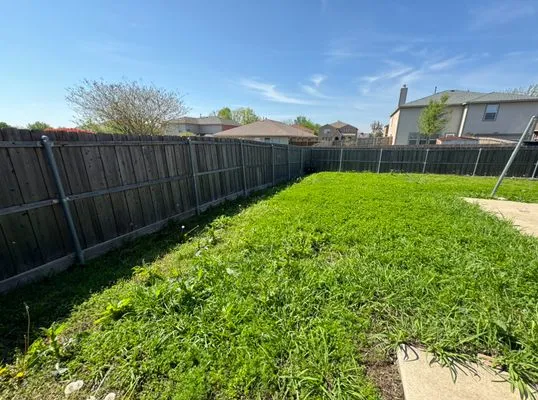 Juniors Lawn Care Logo