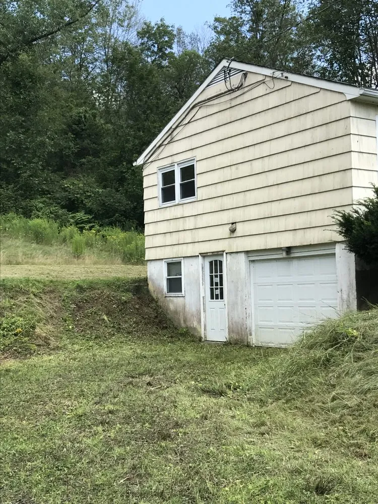 Top-rated residential landscaping with custom design in Lowell, MA by Junk Clean Outs