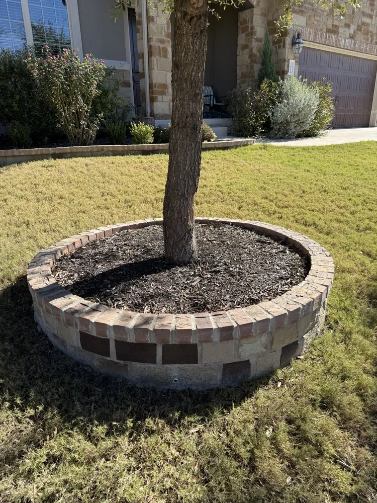 Custom yard maintenance with custom design in Hutto, TX by Jurados Landscaping