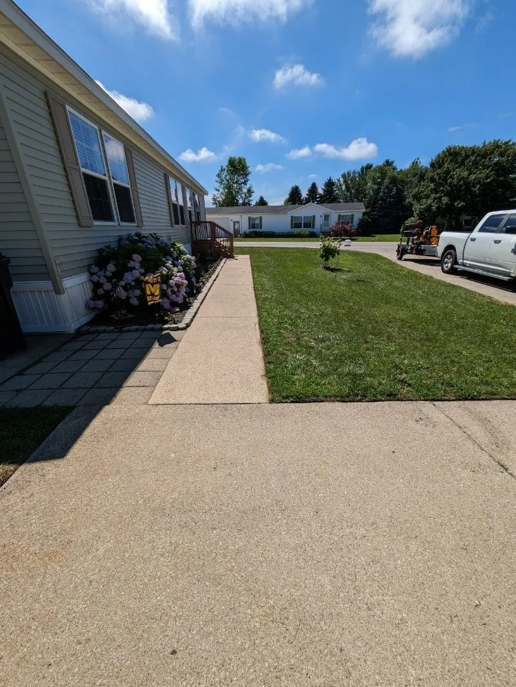 Professional landscape design experts serving Allegan, MI - Just A Clip Lawn Care