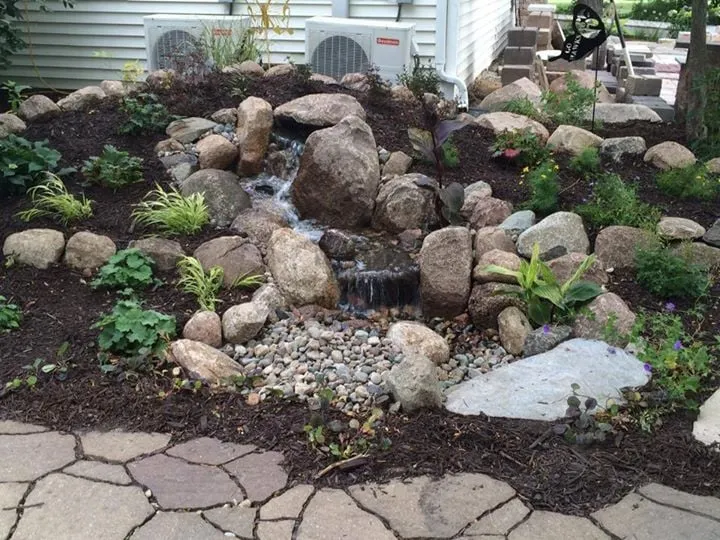 Trusted yard maintenance experts serving Des Moines, IA - Just Add Water