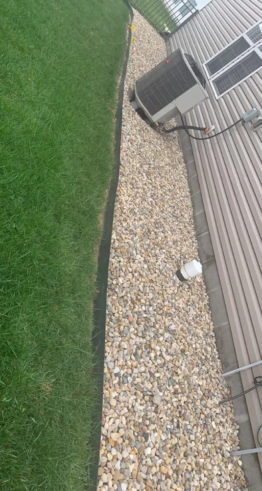 Professional lawn mowing service with custom design in Orange Park, FL by Just Another Deck