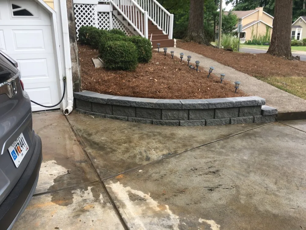 Local yard cleanup service for residential properties in Euharlee, GA by Just Grindin Lawn Care